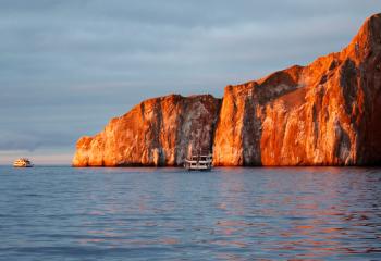 Kicker Rock at sunset near the Galapagos Islands.